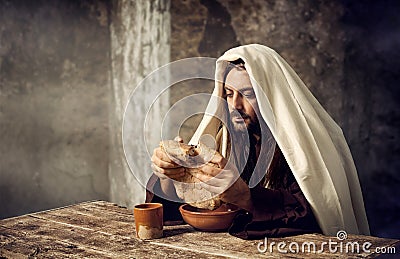 Jesus breaks the bread Stock Photo