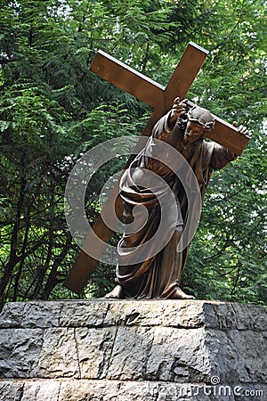 Jesus Carrying the Cross at The National Sanctuary of our Sorrowful Mother the Grotto in Portland, Oregon Editorial Stock Photo