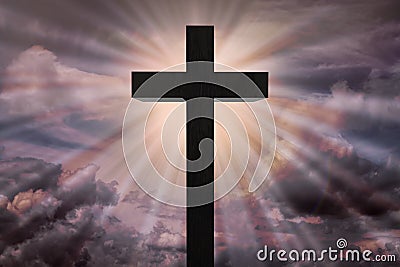 Jesus Christ cross on dramatic sky.Heaven concept Stock Photo