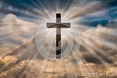 Jesus Christ cross on a sky with dramatic light, clouds, sunbeams. Easter, resurrection, risen Jesus concept Stock Photo