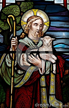 Jesus Christ: The Good Shepherd in stained glass Stock Photo