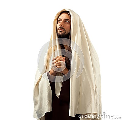 Jesus Christ prays with clasped hands Stock Photo