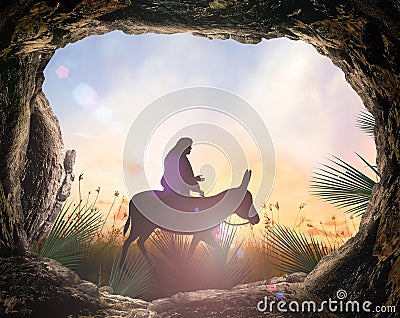 Jesus Christ riding donkey with tomb stone Stock Photo