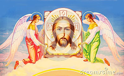 Jesus Christ between two angels Stock Photo