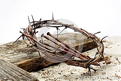 Jesus Crown Thorns and nails and cross on sand. Vintage Retro Style. Stock Photo