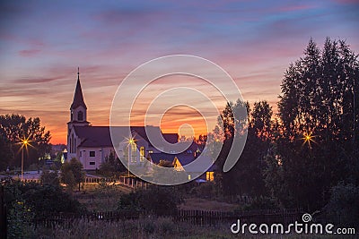 Jesus heart catholics church in the evening in the moonlight Stock Photo