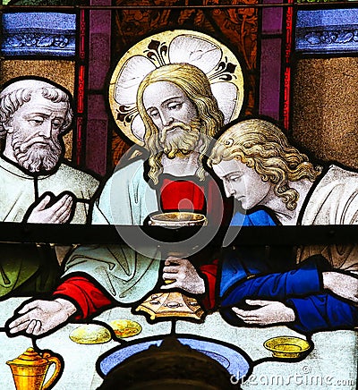 Jesus at Last Supper on Maundy Thursday - Stained Glass in Mechelen Cathedral Stock Photo