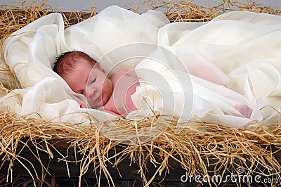 Jesus in a manger Stock Photo