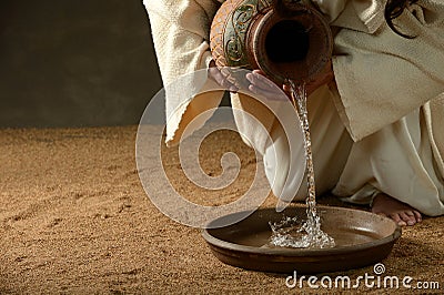 Jesus pouring water Stock Photo