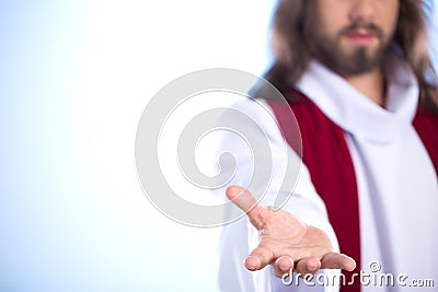 Jesus reaching out his hand Stock Photo