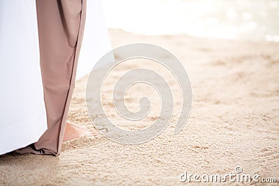 Jesus walking along the ocean Stock Photo