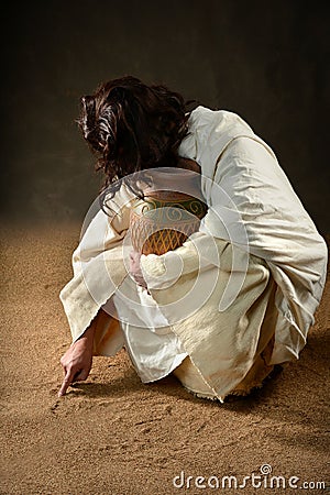 Jesus Writing In The Sand Stock Photos - Image: 27448893