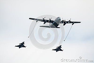 Jet fighters refueling in air Stock Photo