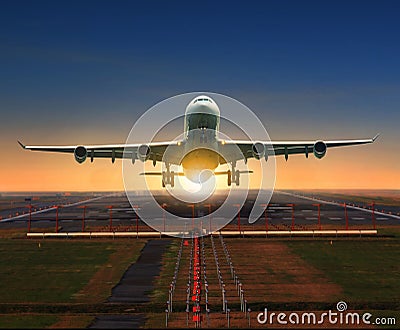 jet plane taking off from airport runway for traveling and logistic theme Stock Photo