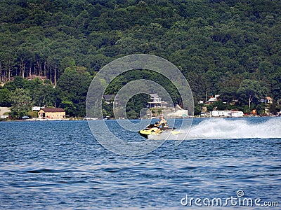 Personal Watercraft fun on Cayuga Lake during summertime Editorial Stock Photo