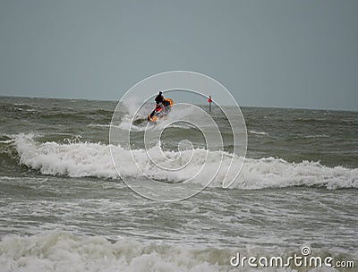 Jets skiers playing during tropical storm hurricane Editorial Stock Photo