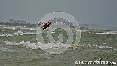 Jets skiers playing during tropical storm hurricane Editorial Stock Photo