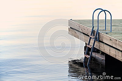 Jetty with ladder Stock Photo