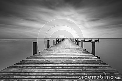 Jetty at lake Starnberger See, Germany, black and white Stock Photo