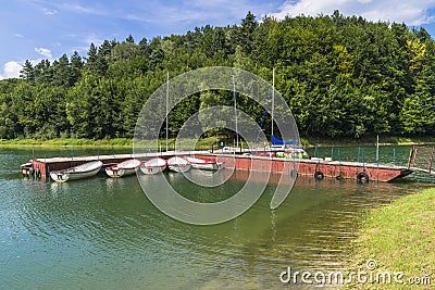 Jetty and sailing boats Stock Photo