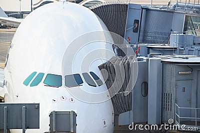 Jetway bridges and airplane waiting boarding Stock Photo