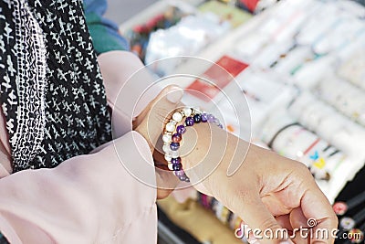 Jeweler bracelet on the female wrist. Stock Photo