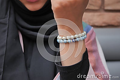 Jeweler bracelet on the female wrist. Stock Photo