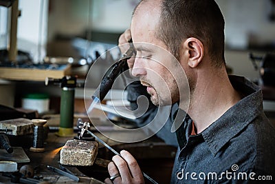 Jeweler silver soldering Stock Photo