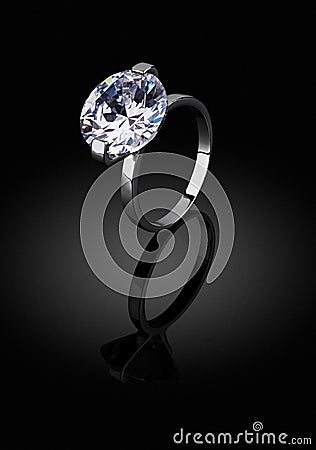 Jewelery ring with big diamond on black background, clipping pat Stock Photo