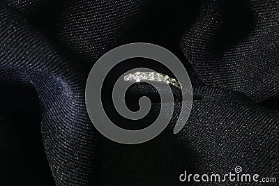 Jewellery diamond ring on a black background Stock Photo