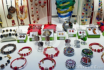 Jewelries from Murano glass in gift shop in Venice Editorial Stock Photo