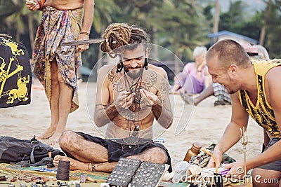 Jewelry artist selling his art at Kudli beach, Gokarna, Karnataka, India Editorial Stock Photo