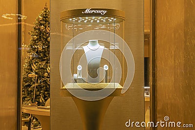 Jewelry boutique store Mercury in Moscow. Selling luxury jewelry shop. Christmas decoration Mercury store - Moscow, Russia, 24.12. Editorial Stock Photo