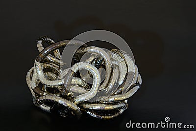 Jewelry decoration curled metal on the black background Stock Photo