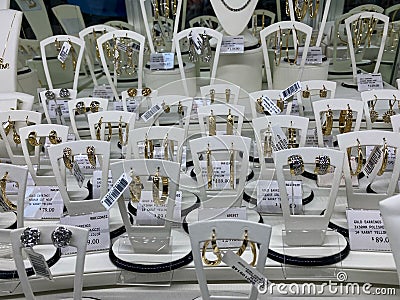 A jewelry display case of diamond earrings waiting for customers to purchase at a Sams Club retail store Editorial Stock Photo