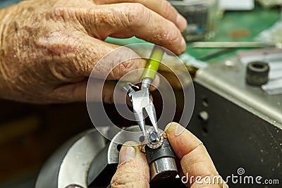 Jewelry production. The process of fixing stones Stock Photo