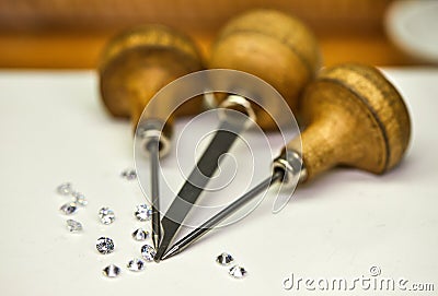 Jewelry production. Tool for fixing diamonds on a white background Stock Photo