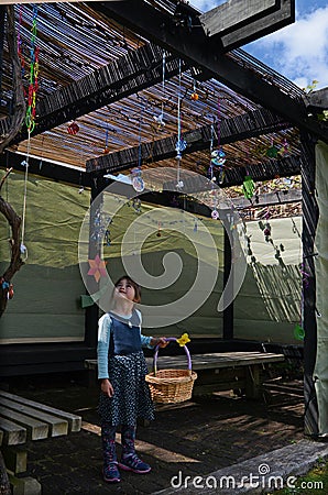 Jewish child decorating the family Sukkah Stock Photo