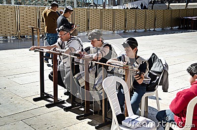 Jewish family praying in Jerusalem Editorial Stock Photo