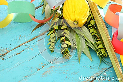 Jewish festival of Sukkot. Traditional symbols & x28;The four species& x29;: Etrog, lulav, hadas, arava. Stock Photo