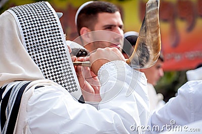 Jewish hasid blows Shofar. Rosh Hashanah, Jewish New Year. Editorial Stock Photo