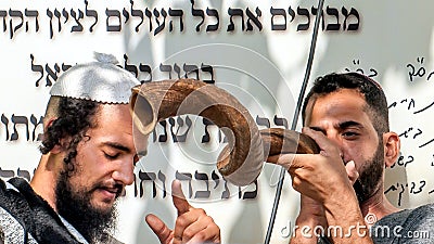 Jewish hasid blows Shofar. Rosh Hashanah, Jewish New Year. Editorial Stock Photo