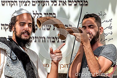 Jewish hasid blows Shofar. Rosh Hashanah, Jewish New Year. Editorial Stock Photo