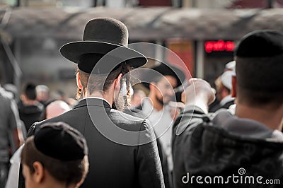 The Jewish Hasid in traditional clothes with long payos. Editorial Stock Photo