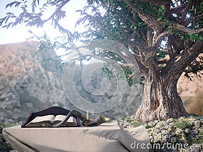 Jewish holiday background with old book and olive tree landscape concept photo Stock Photo