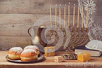 Jewish holiday Hanukkah celebration with vintage menorah Stock Photo