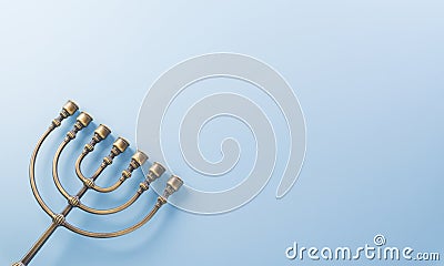 Jewish holiday Hanukkah concept. Top view of goldren menorah on pastel blue background Stock Photo