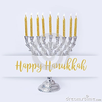 Jewish holiday Hanukkah greeting design with menorah on white ba Stock Photo