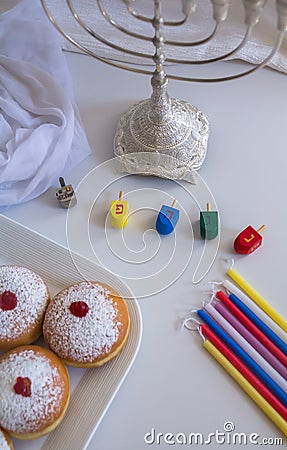 Jewish holiday Hanukkah symbols against white background Stock Photo