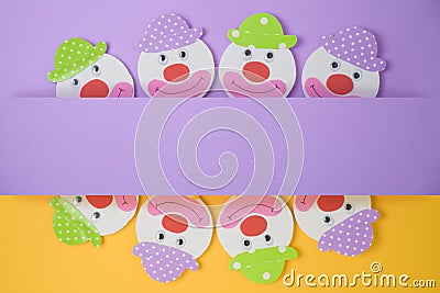 Jewish holiday Purim background with childish paper clowns Stock Photo